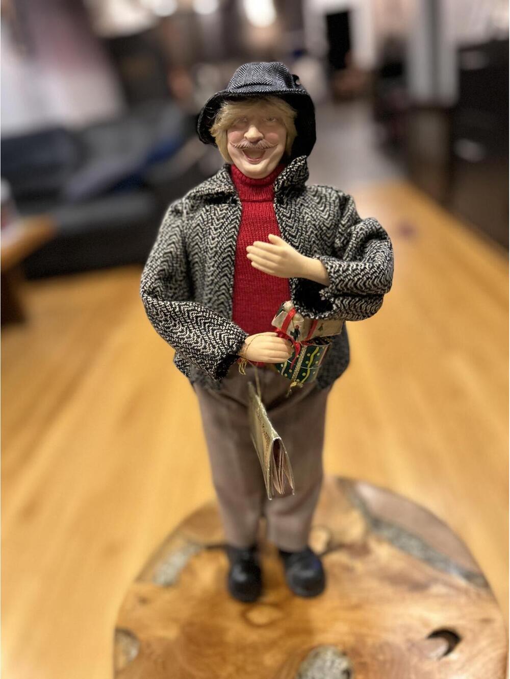Dennis East International Christmas Caroler